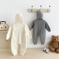 Thumbnail for PlayfulKnit – Delikatny i uroczy – dzianinowy kombinezon dla niemowląt z nadrukiem psów
