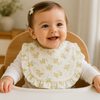 BabyBloom – Urocze i wygodne – śliniaczek dla niemowląt z falbaną