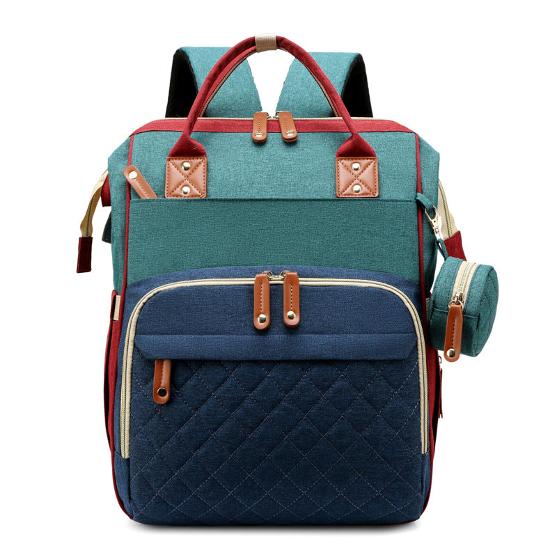TravelNest – Zawsze miejsce do odpoczynku – torba na pieluchy 2 w 1 z łóżeczkiem dla dziecka