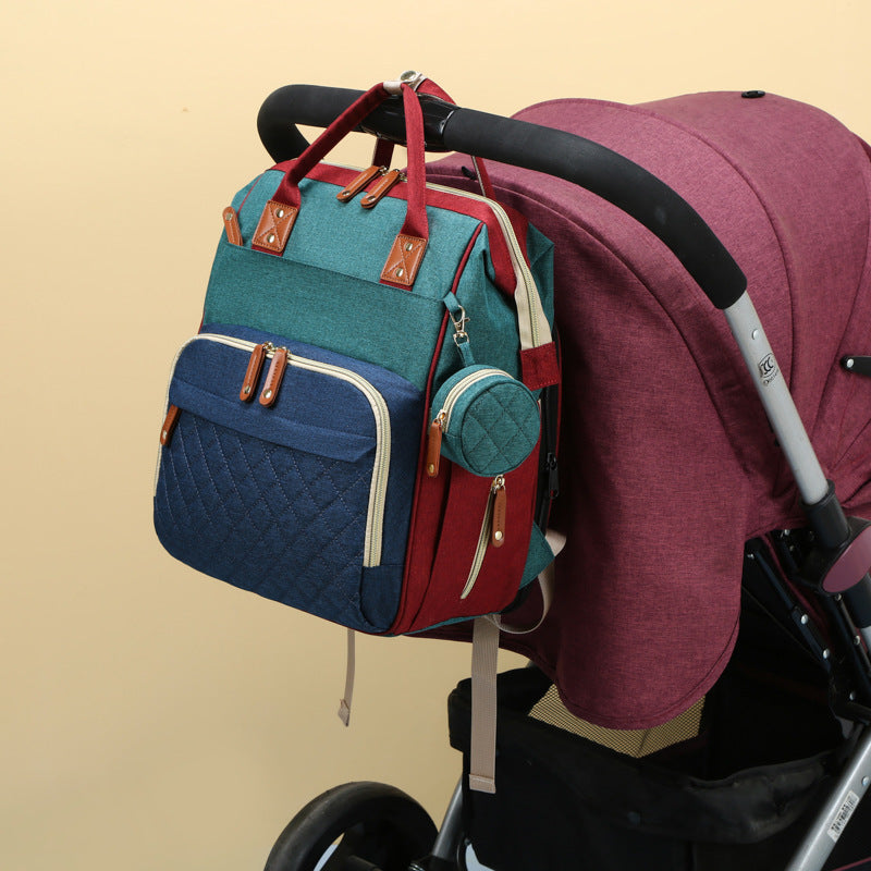 TravelNest – Zawsze miejsce do odpoczynku – torba na pieluchy 2 w 1 z łóżeczkiem dla dziecka