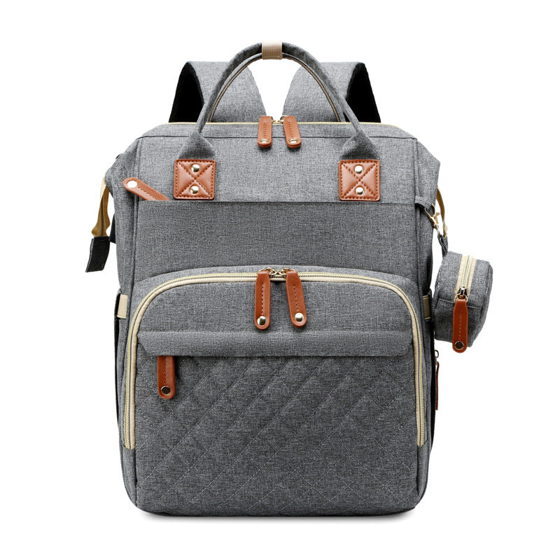 TravelNest – Zawsze miejsce do odpoczynku – torba na pieluchy 2 w 1 z łóżeczkiem dla dziecka