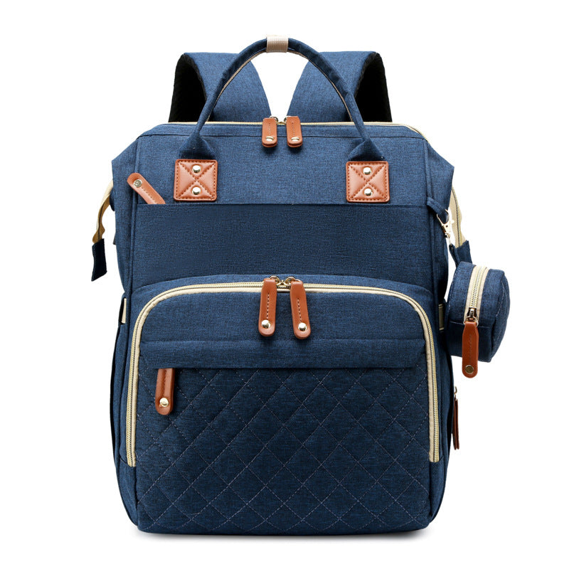 TravelNest – Zawsze miejsce do odpoczynku – torba na pieluchy 2 w 1 z łóżeczkiem dla dziecka