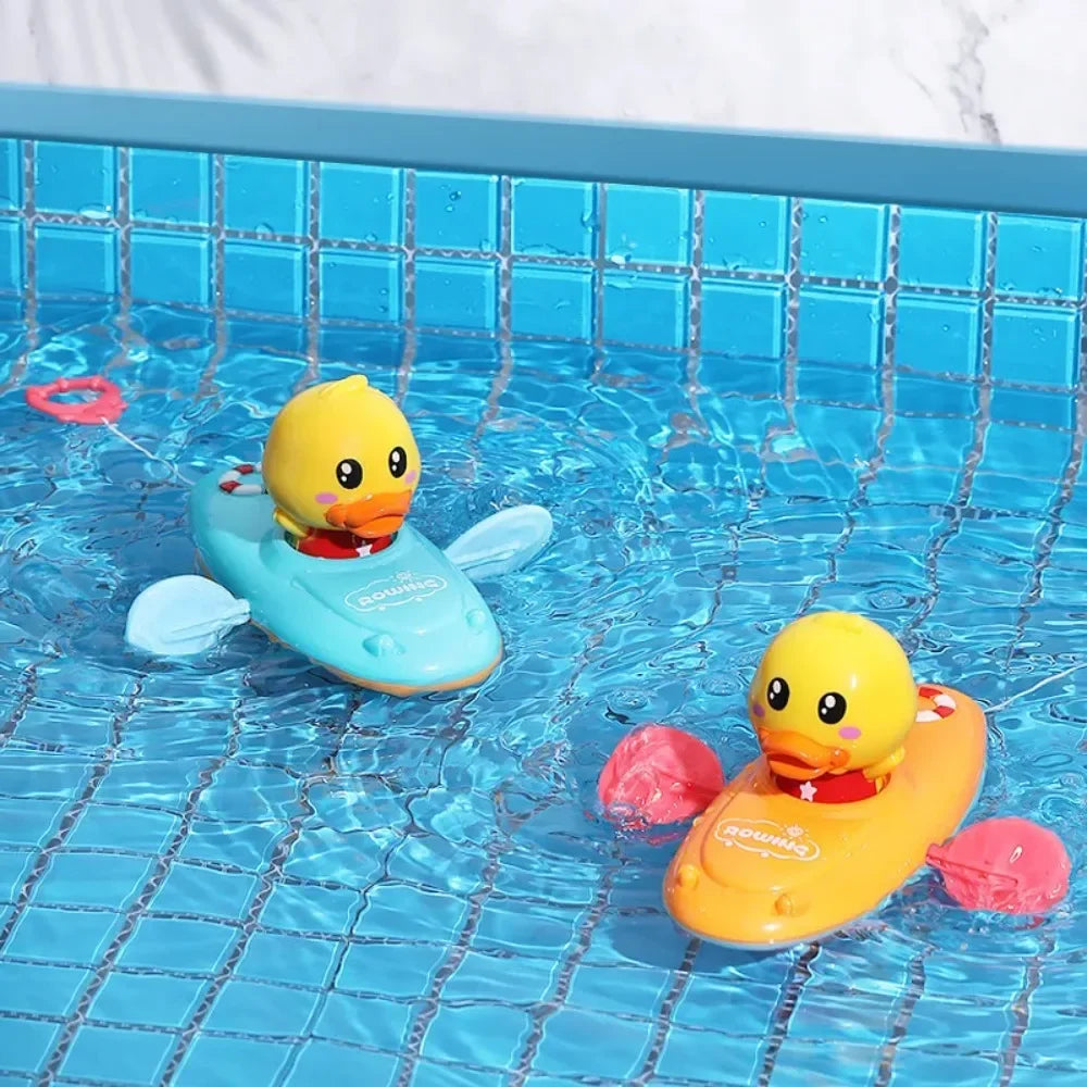 Little Duck Swim™ – Przyjaciel do kąpieli Splash Fun - gumowa kaczka do wiosłowania