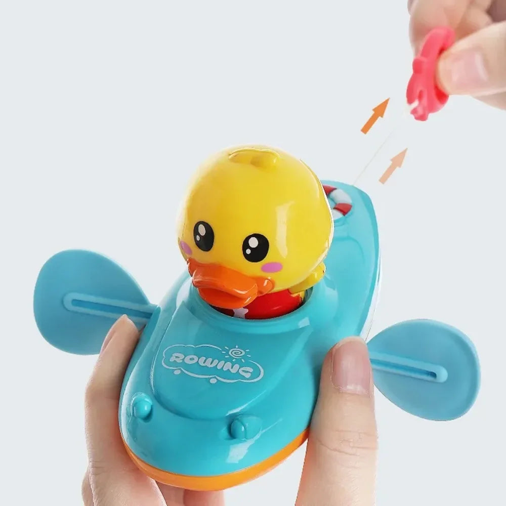 Little Duck Swim™ – Przyjaciel do kąpieli Splash Fun - gumowa kaczka do wiosłowania